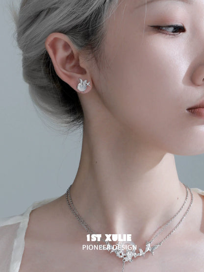 Elegant silver butterfly stud earrings showcasing a delicate design perfect for everyday wear