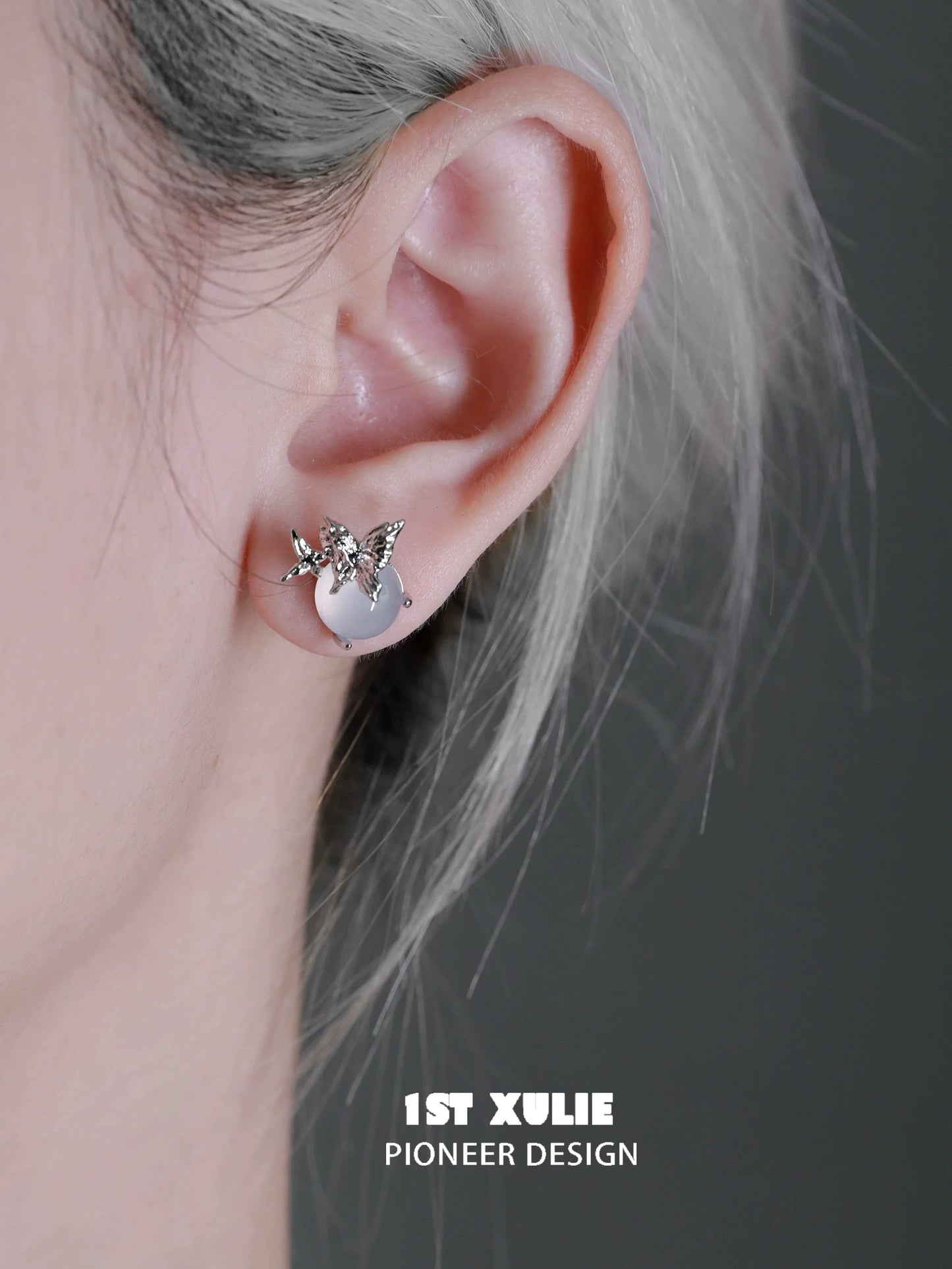 Stylish silver butterfly stud earrings designed by 1STXULIE for a trendy look