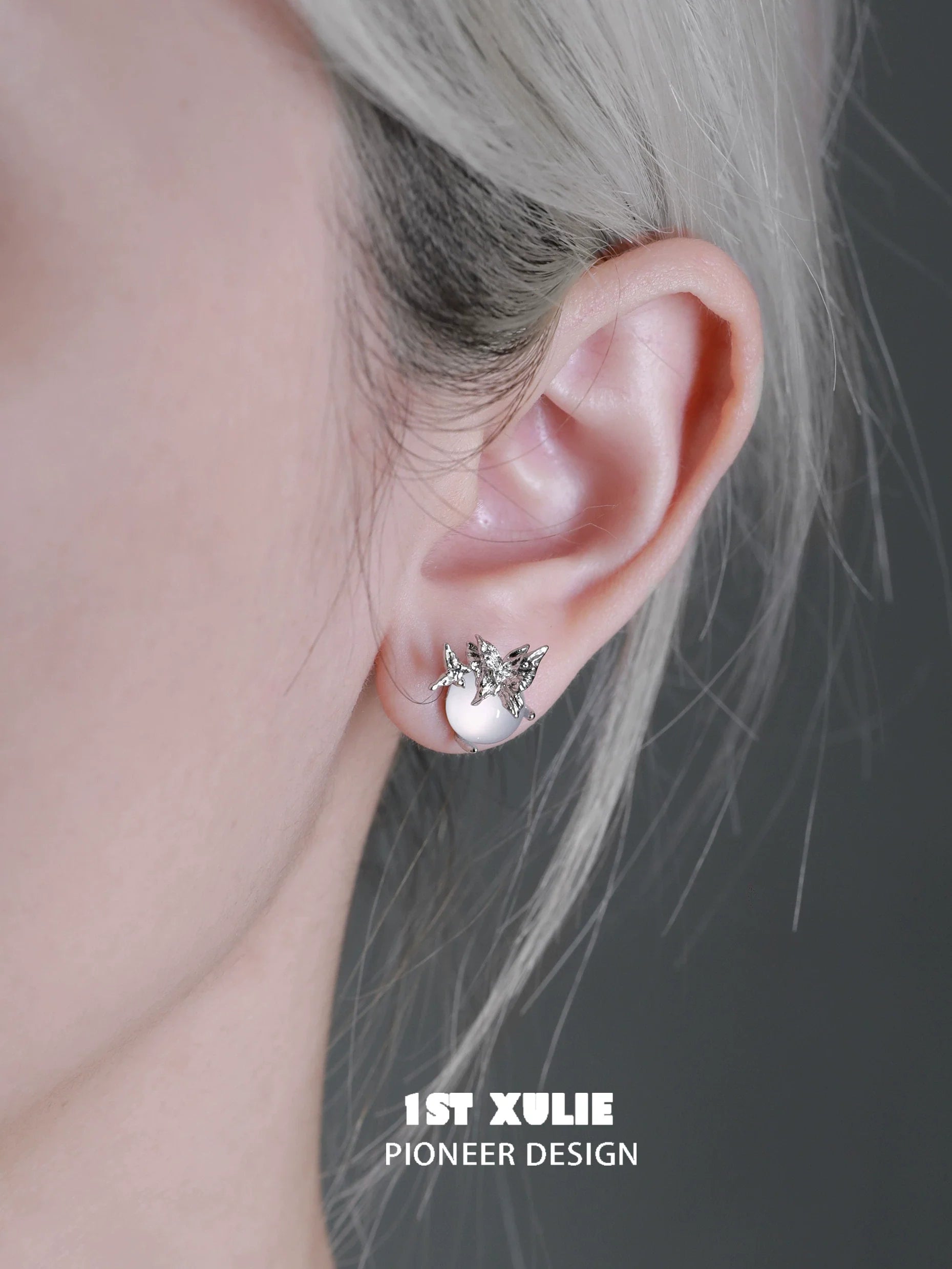 Elegant silver butterfly stud earrings for a stylish and modern look on any occasion