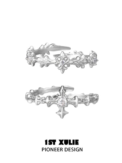 Stylish silver cross couple rings with floral designs and sparkling accents for romantic pairings