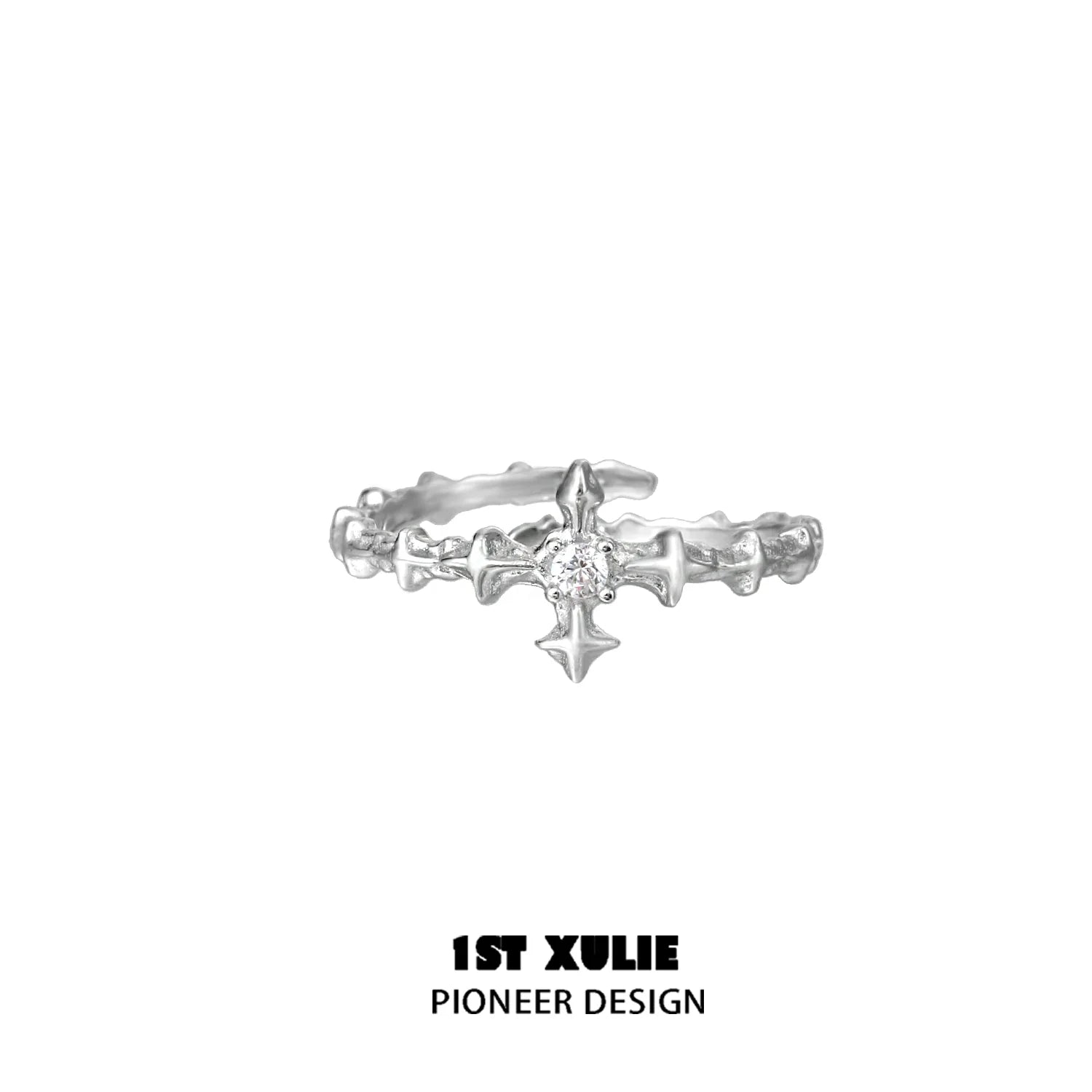 Elegant silver cross couple rings featuring a delicate design and sparkling center stone