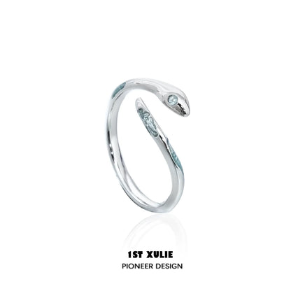 Stylish silver snake ring featuring a sleek design and gemstone accent for trendy jewelry lovers