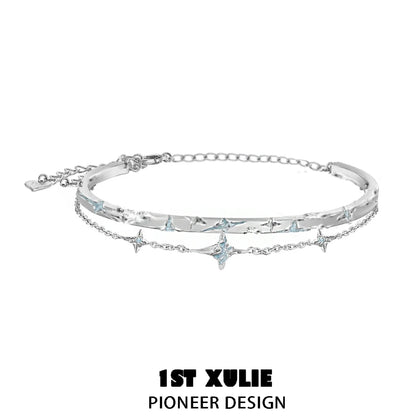 Elegant silver starlight bracelet featuring star charms and a sleek design for everyday wear