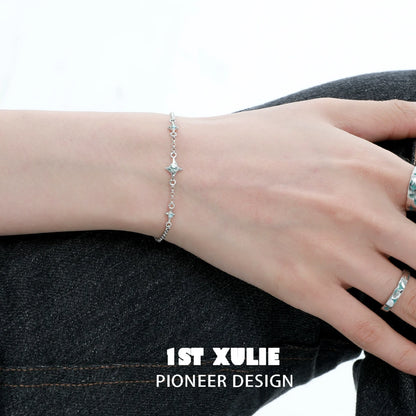 1STXULIE Silver Starlight Bracelet elegantly displayed on a wrist for a shimmering look