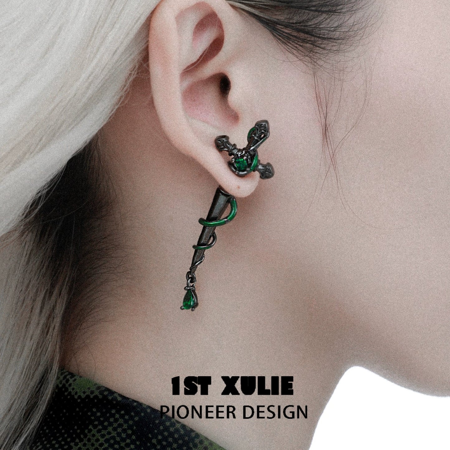 Slytherin inspired cross earrings with intricate design and green accents for stylish fans