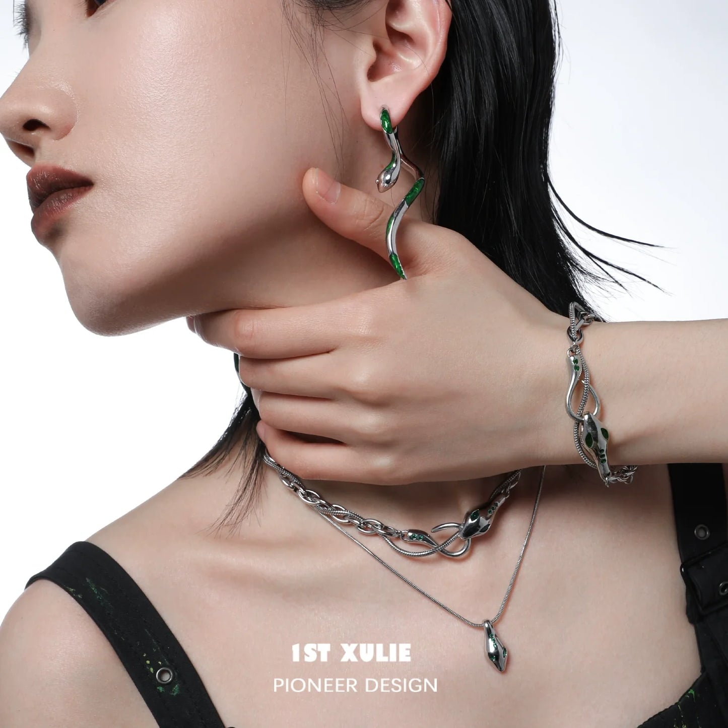 Slytherin snake bracelet showcased on a model, featuring a stylish chain design with green accents