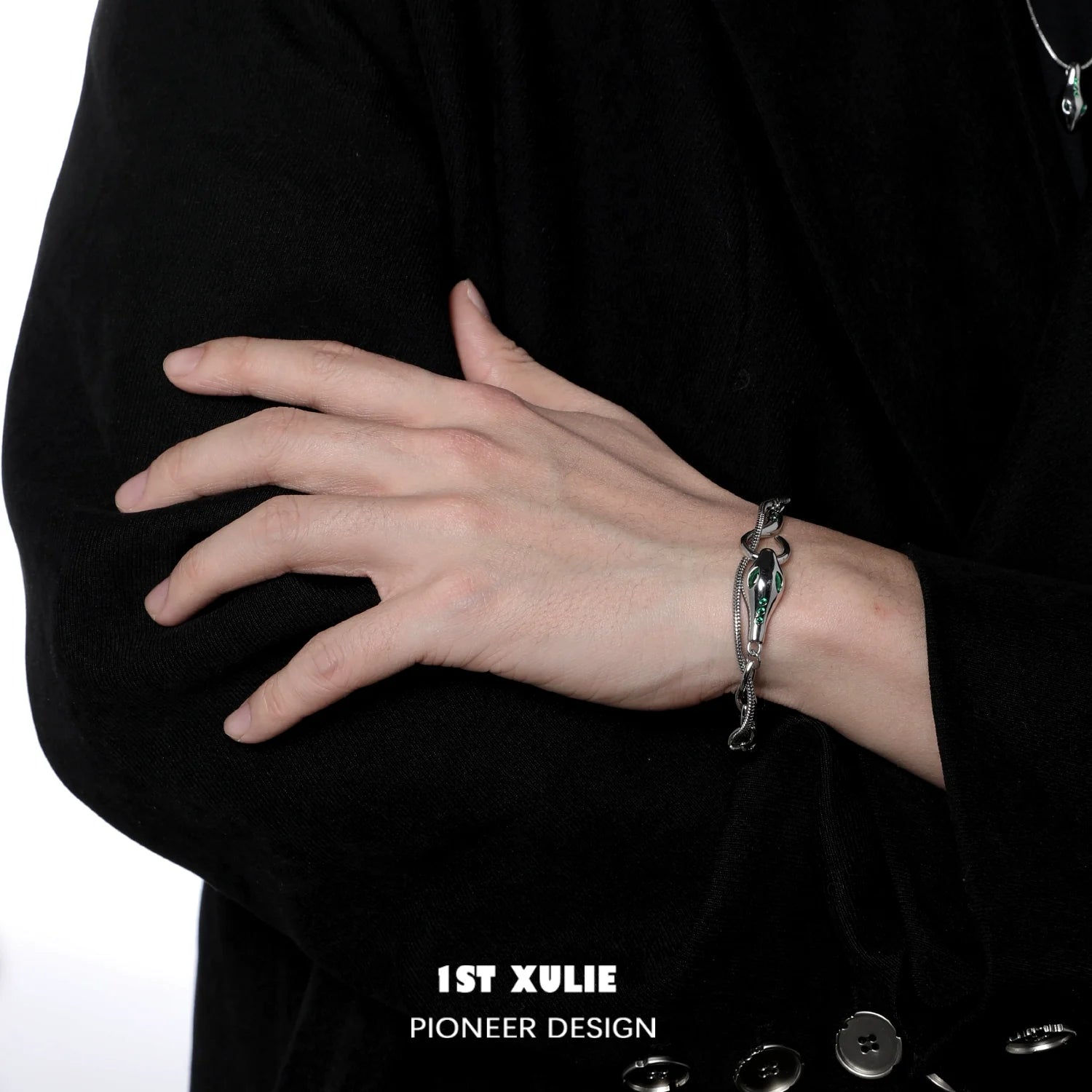 Slytherin snake bracelet in silver with intricate design worn on a person's wrist