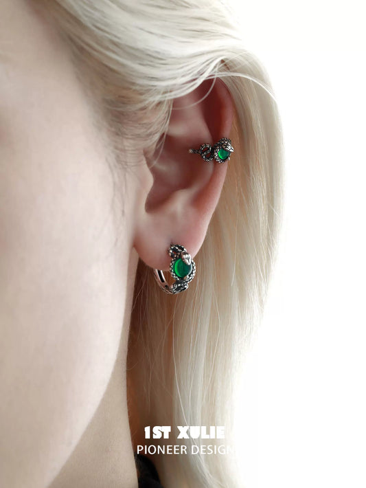 Stylish Slytherin snake ear cuff in silver with green accents for a magical accessory look