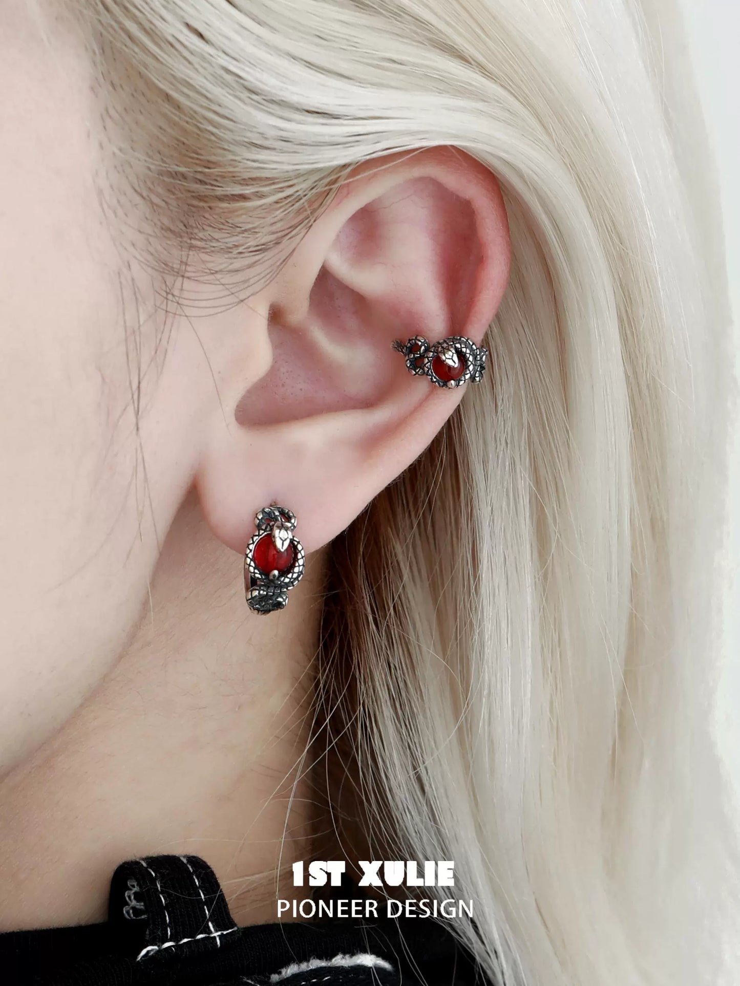 Slytherin snake ear cuff featuring a serpent design and red gemstone accents