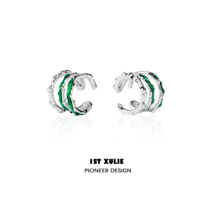Slytherin snake ear cuff in silver and green for a stylish wizarding accessory