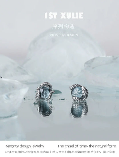 Elegant Slytherin snake earrings with intricate detailing and a silver finish for fans of Harry Potter