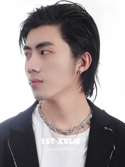 Stylish model wearing Slytherin snake earrings that showcase sleek design and elegance
