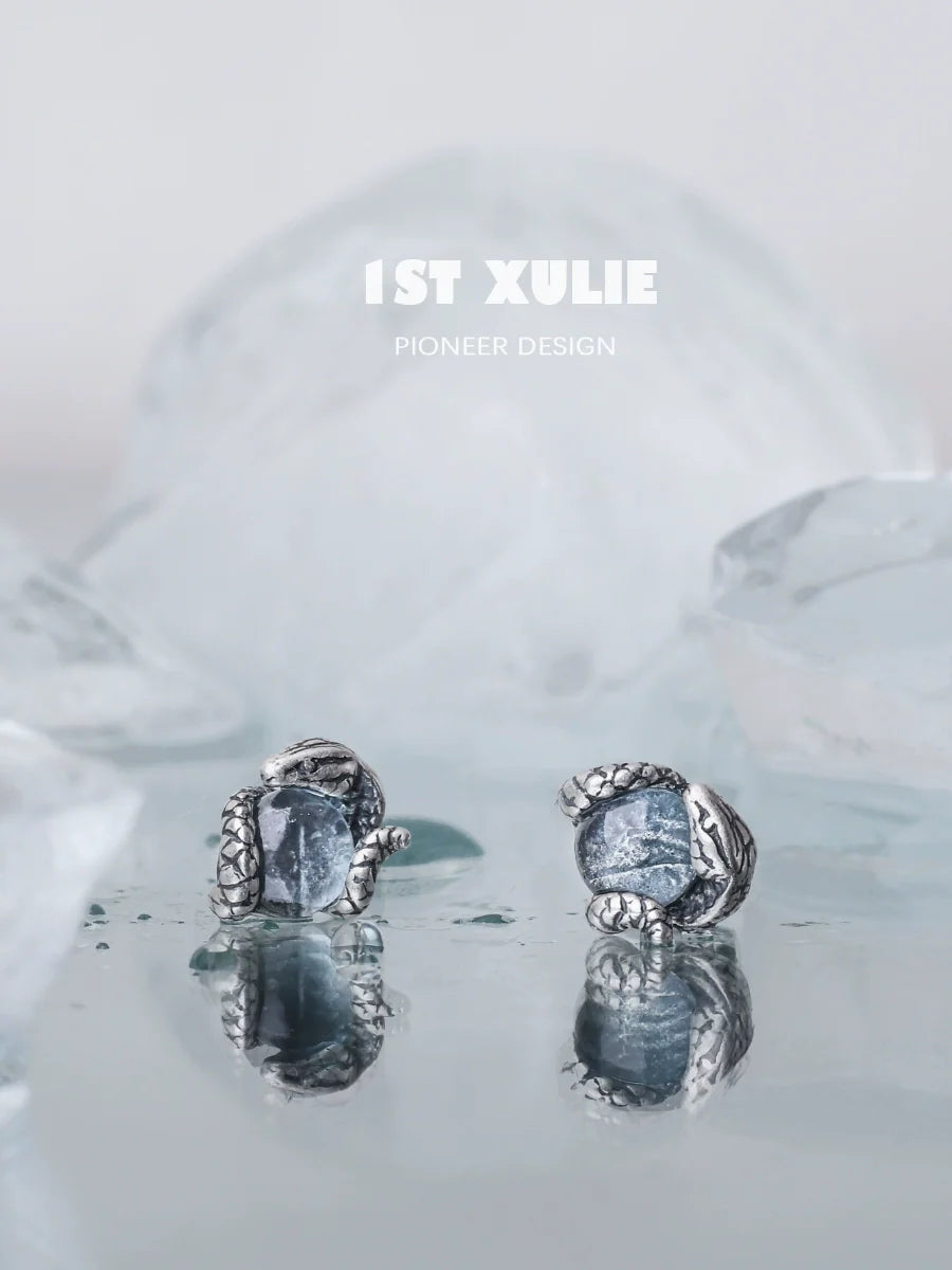 Slytherin snake earrings with detailed silver design featuring sparkling gems for unique style