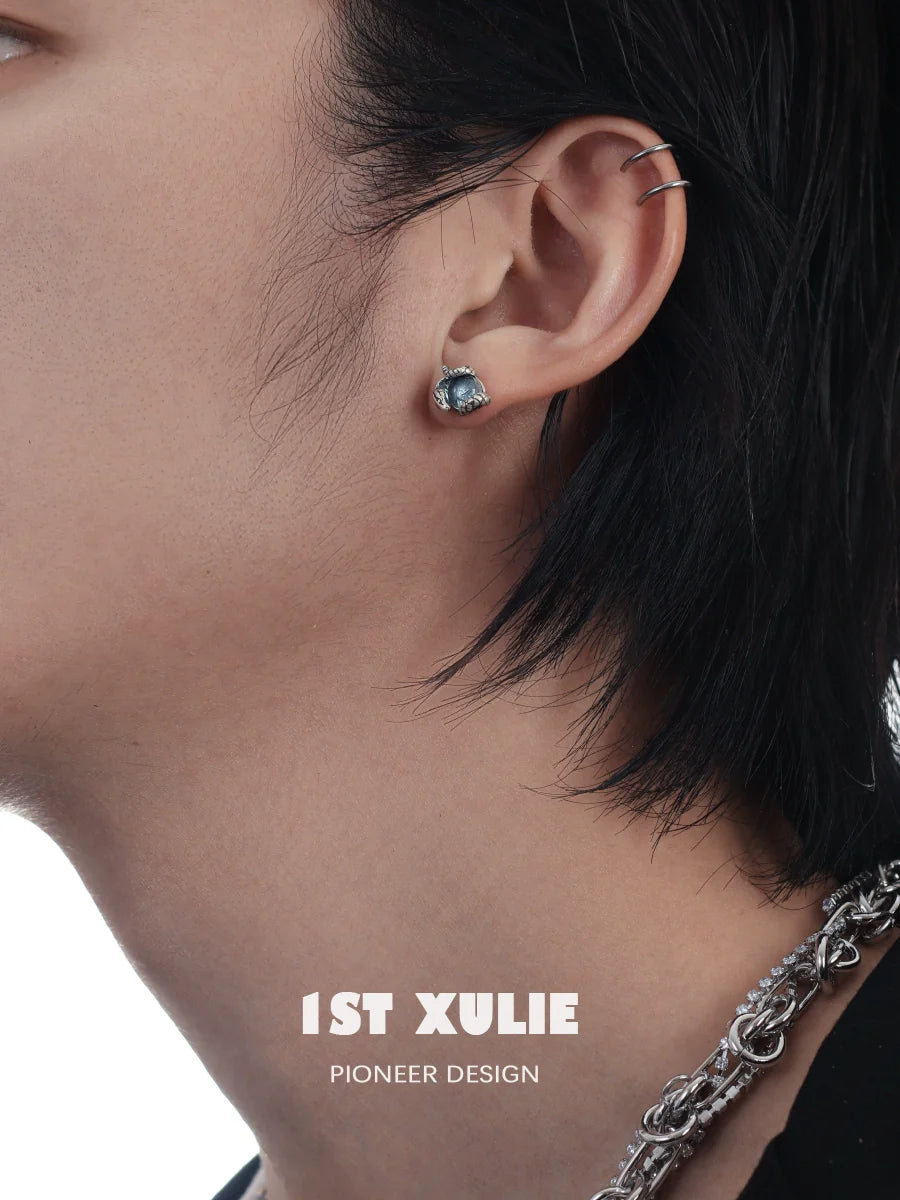 Slytherin snake earrings featuring a sleek design worn by a model, perfect for fans of the Hogwarts House