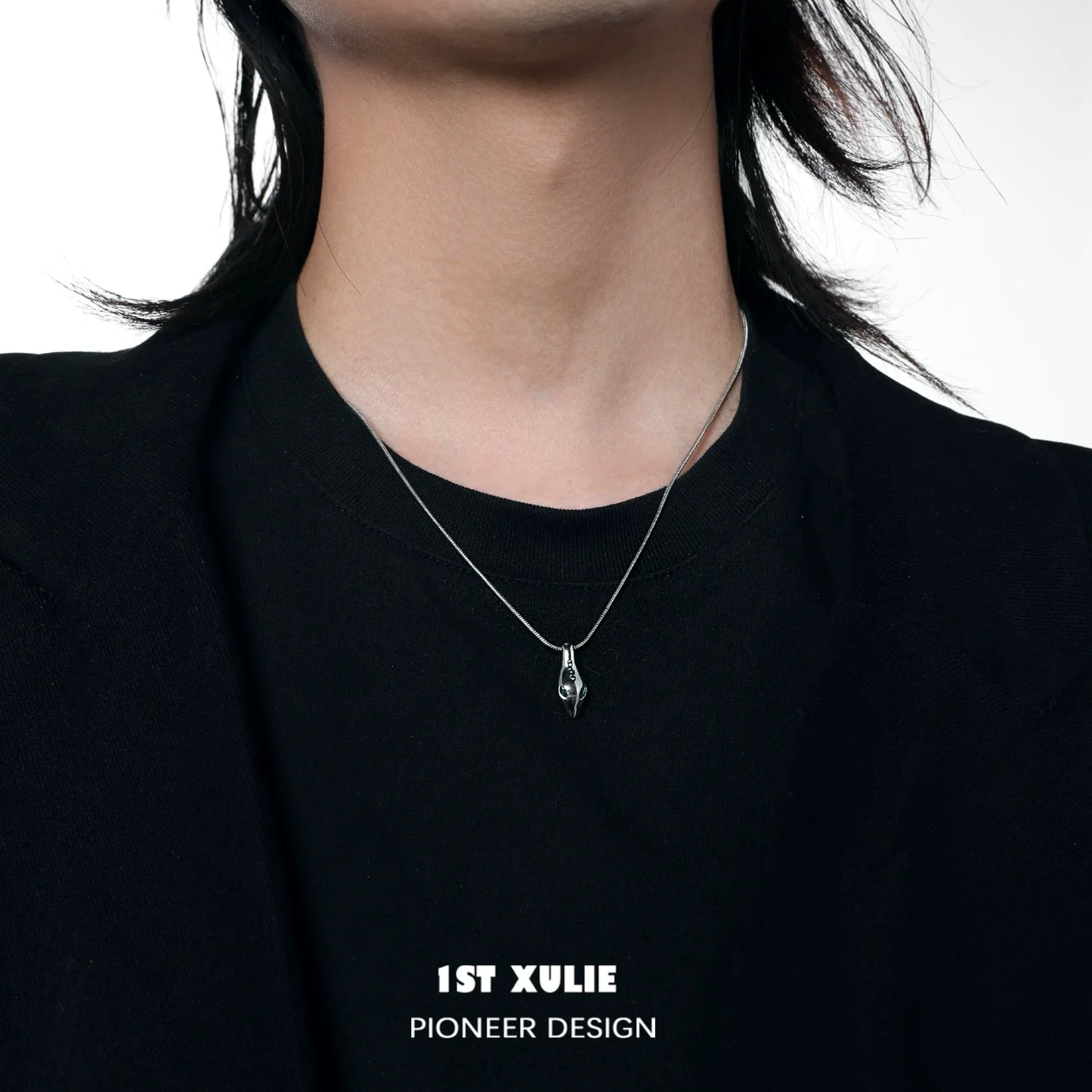 Slytherin snake necklace worn by a model showcasing its sleek design and silver finish