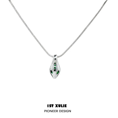 Sterling silver Slytherin snake necklace with emerald accents for fans of the Harry Potter series