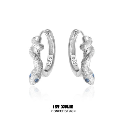 Snake hoop earrings silver with sparkling texture and blue gemstone accents for a stylish look