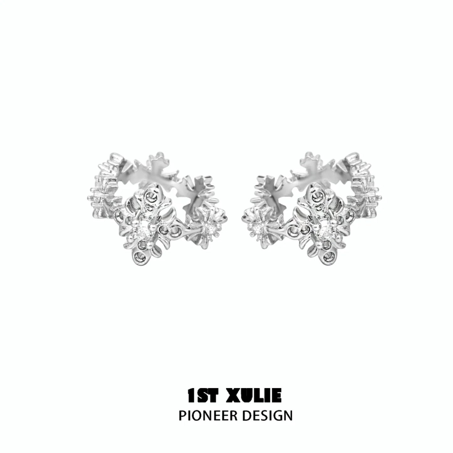 Stylish spiked cross earrings in silver, perfect for edgy fashion statements and versatile wear