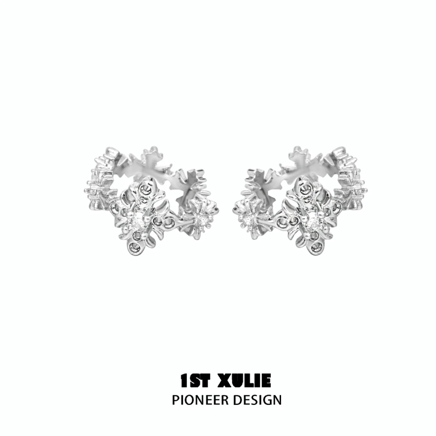 Stylish spiked cross earrings in silver, perfect for edgy fashion statements and versatile wear
