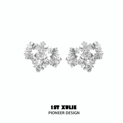 Stylish spiked cross earrings in silver, perfect for edgy fashion statements and versatile wear