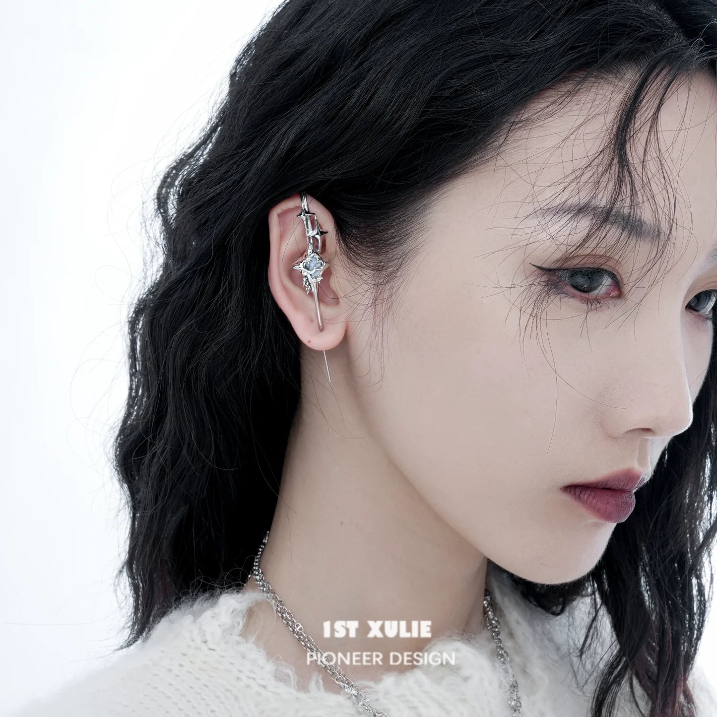 Star Guardian ear piercing needle showcasing a stylish and unique design on a model's ear
