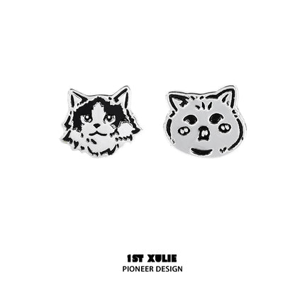 Unique street art cat earrings featuring playful cat designs in black and silver