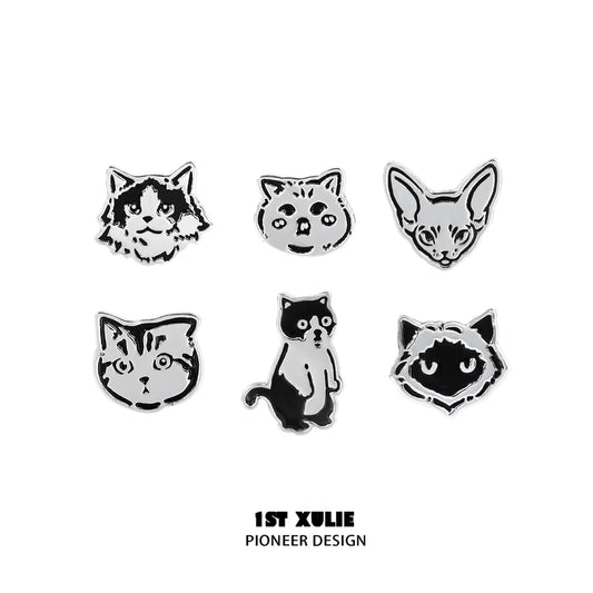 Set of street art cat earrings featuring six unique cat designs in a stylish silver finish