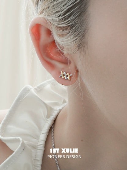 Elegant twisted bow earrings in gold from 1STXULIE, perfect for adding a unique touch to any outfit