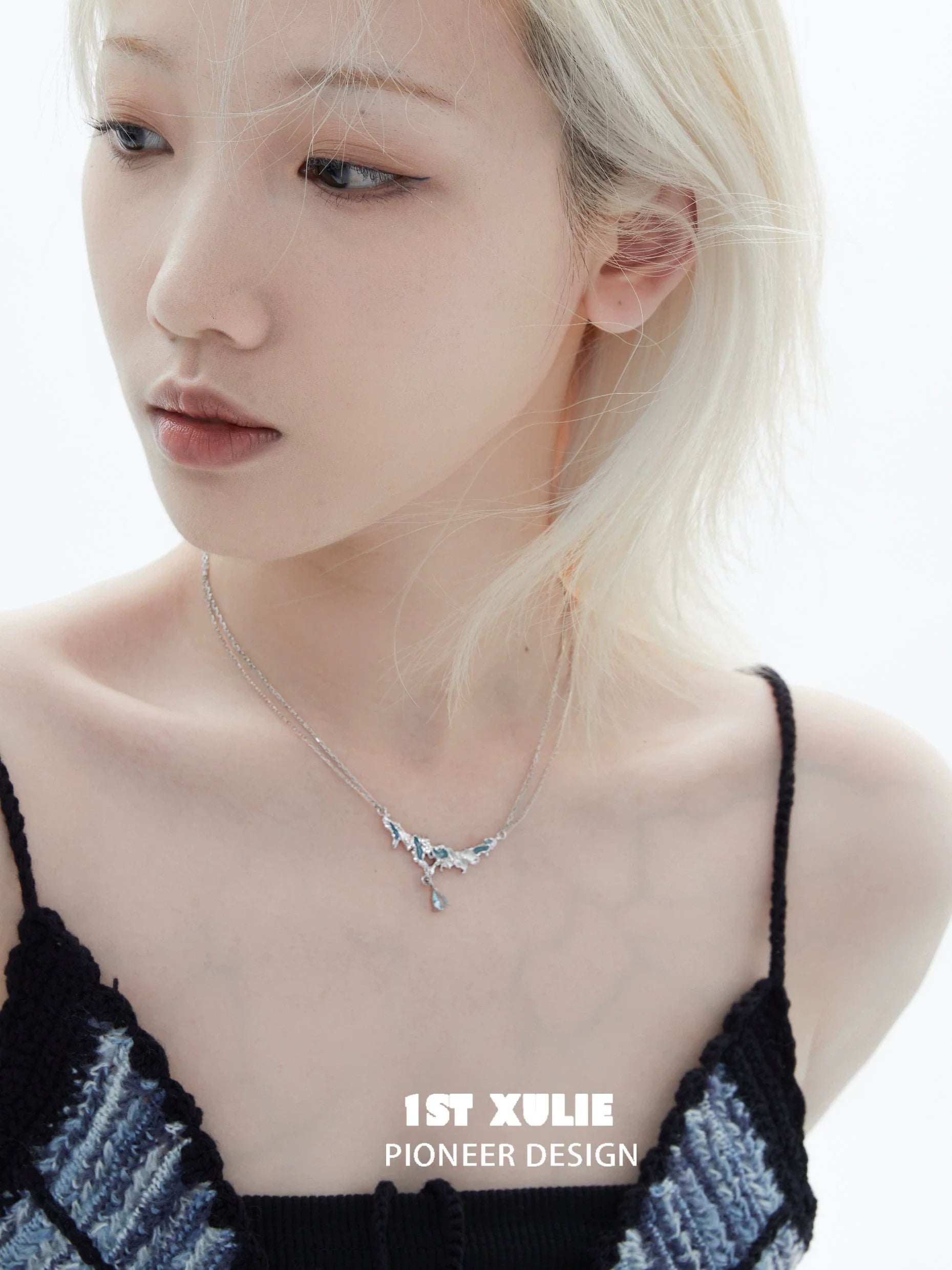Model wearing a unique silver sea necklace with delicate design for ocean-inspired fashion