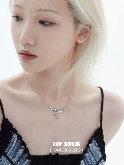 Model wearing a unique silver sea necklace with delicate design for ocean-inspired fashion