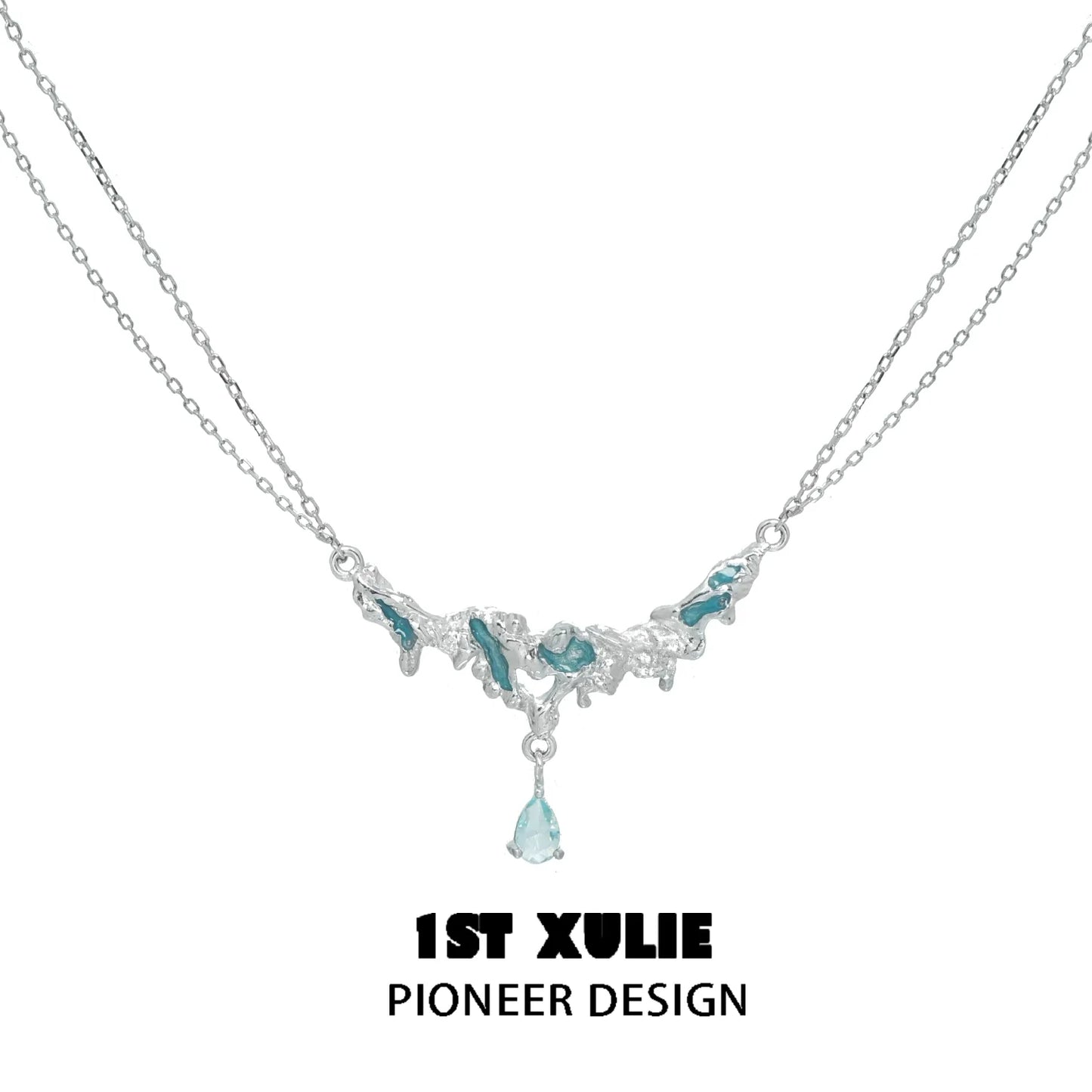 Unique silver sea necklace with intricate design and blue accents for a stylish look