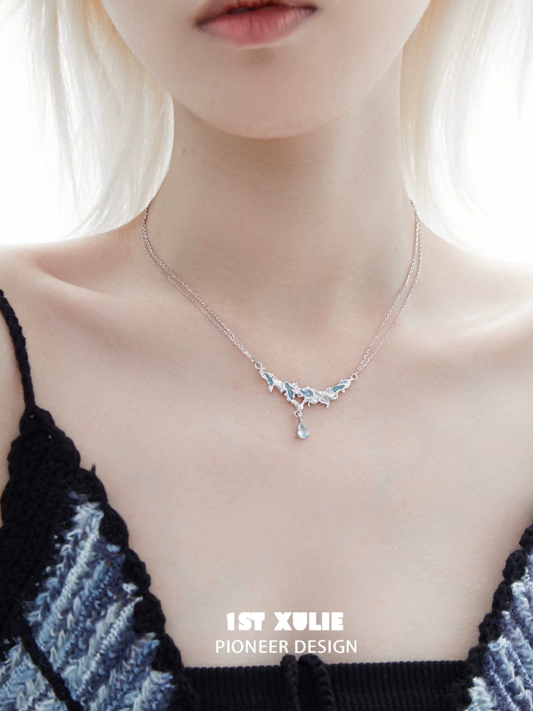 Unique silver sea necklace by 1ST XULIE featuring a delicate design with ocean-inspired elements