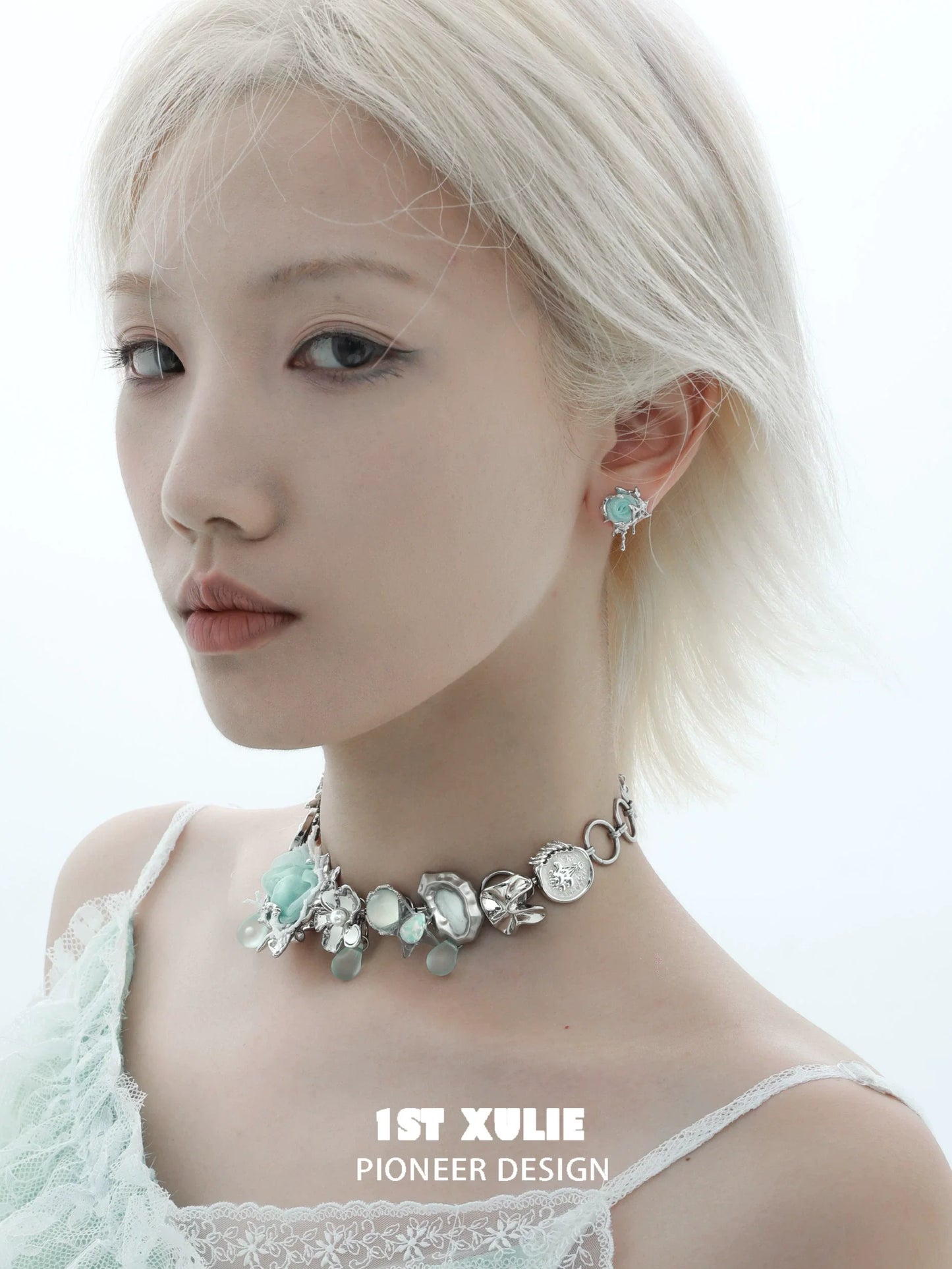 Elegant model showcasing velvet rose stud earrings in a minimalist design with a chic outfit