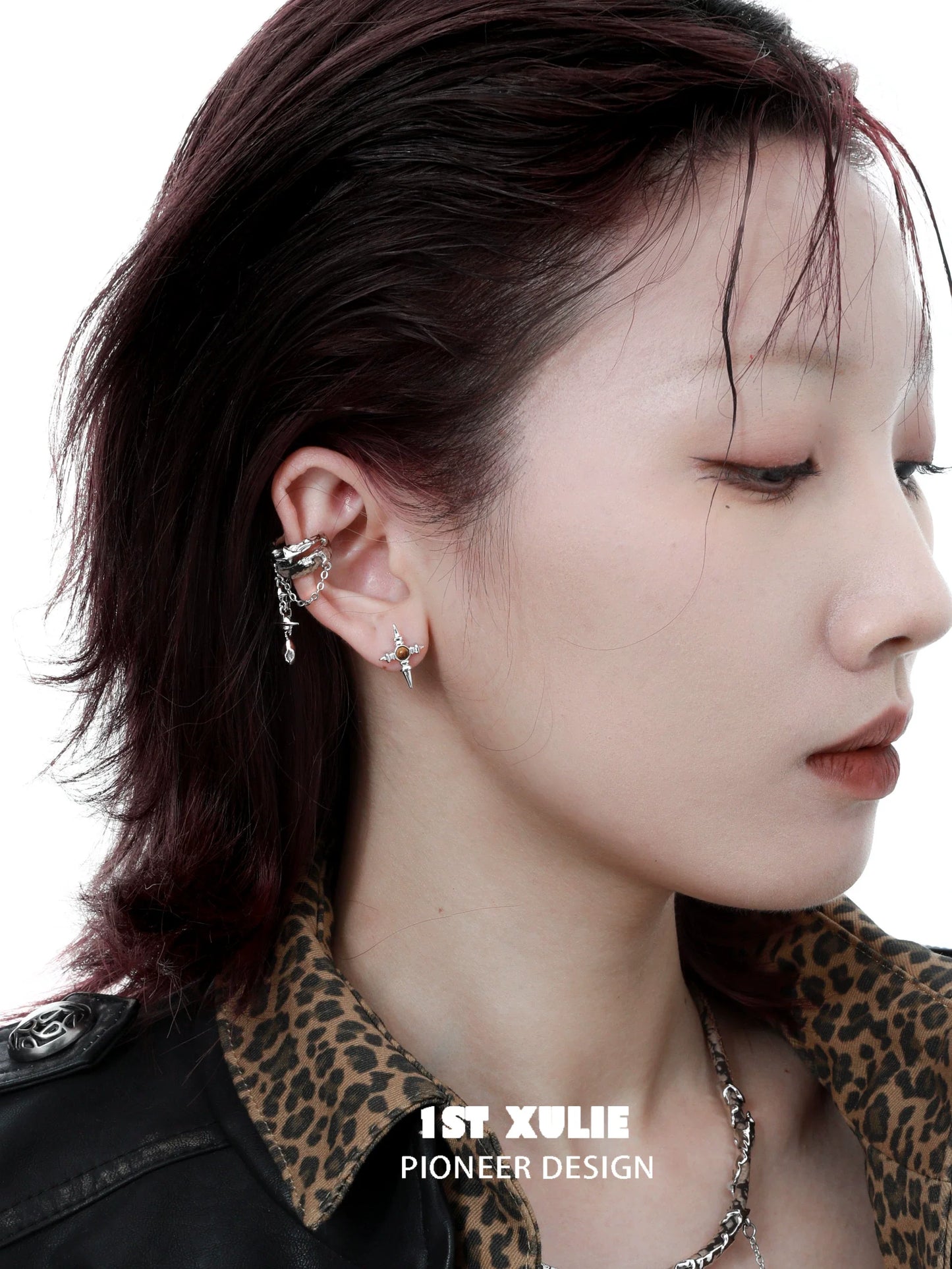 Stylish Wasteland Ear Cuff Earrings displayed on a model with a chic hairstyle and leopard print top