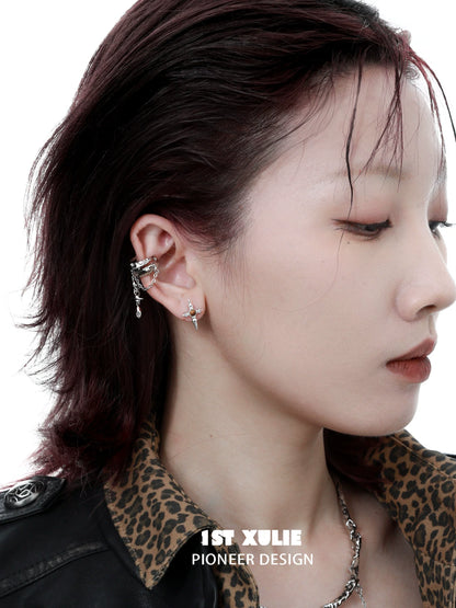 Stylish Wasteland Ear Cuff Earrings displayed on a model with a chic hairstyle and leopard print top