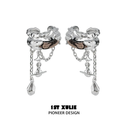 Wasteland ear cuff earrings by 1STXULIE with a unique design featuring chains and metallic details