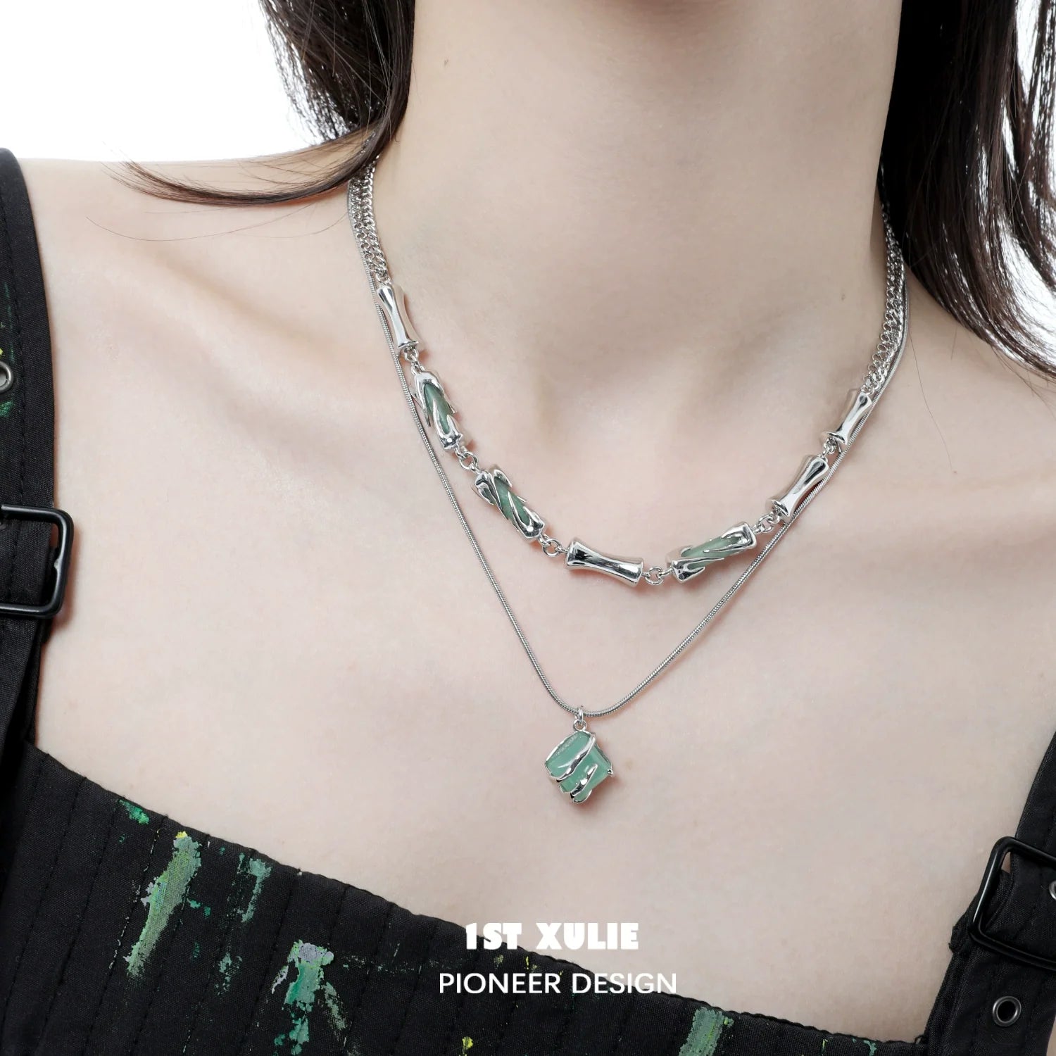 Layered Y2K bamboo necklace from 1STXULIE featuring green bamboo elements and silver chains