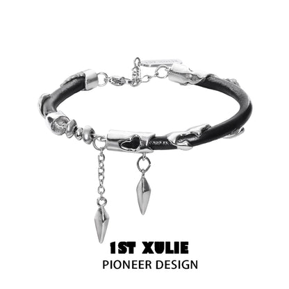 Y2K black chain leather bracelet with silver accents and decorative spikes for a stylish look