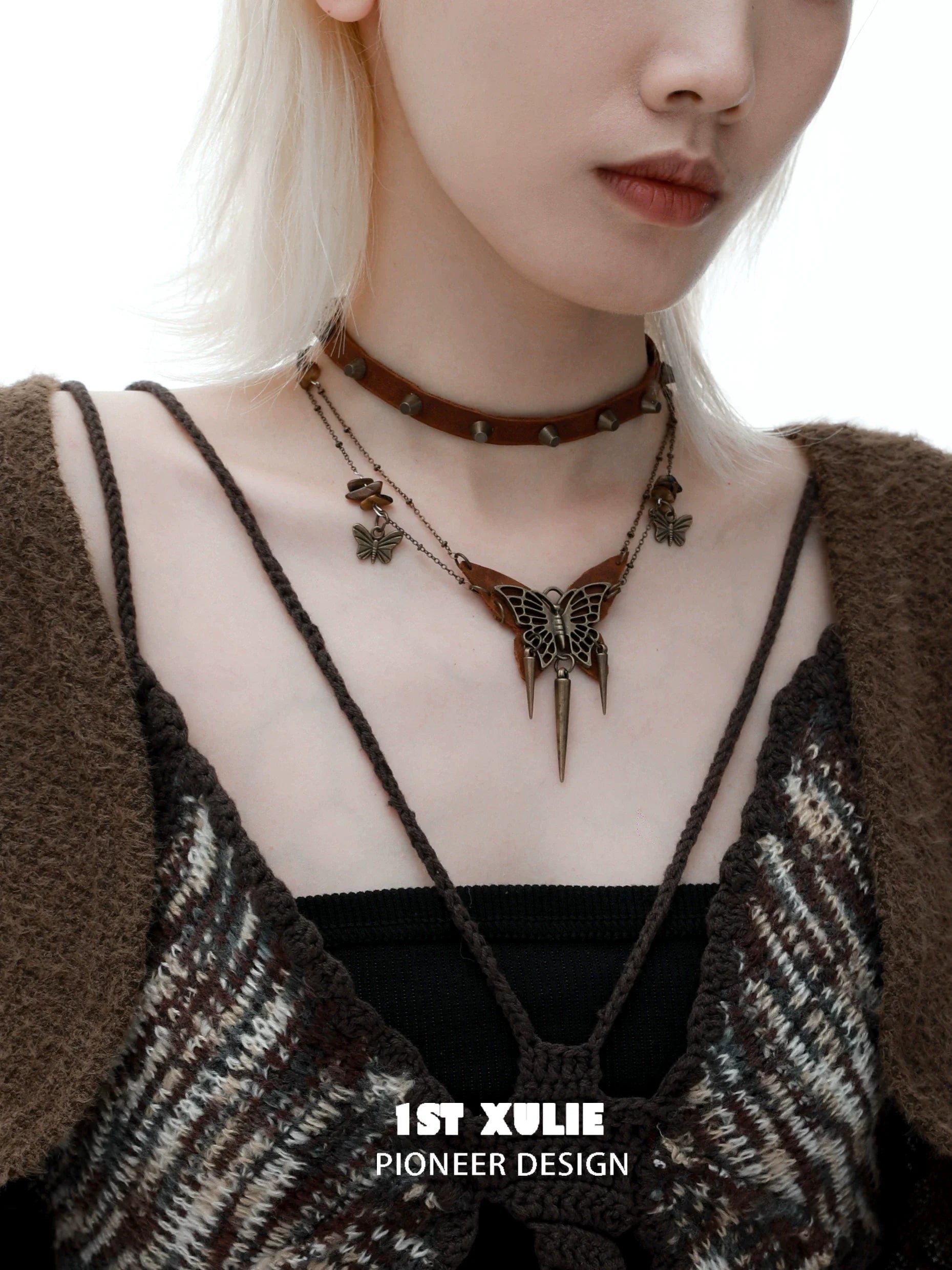 Y2K butterfly leather necklace with layered design and decorative charms for a trendy look