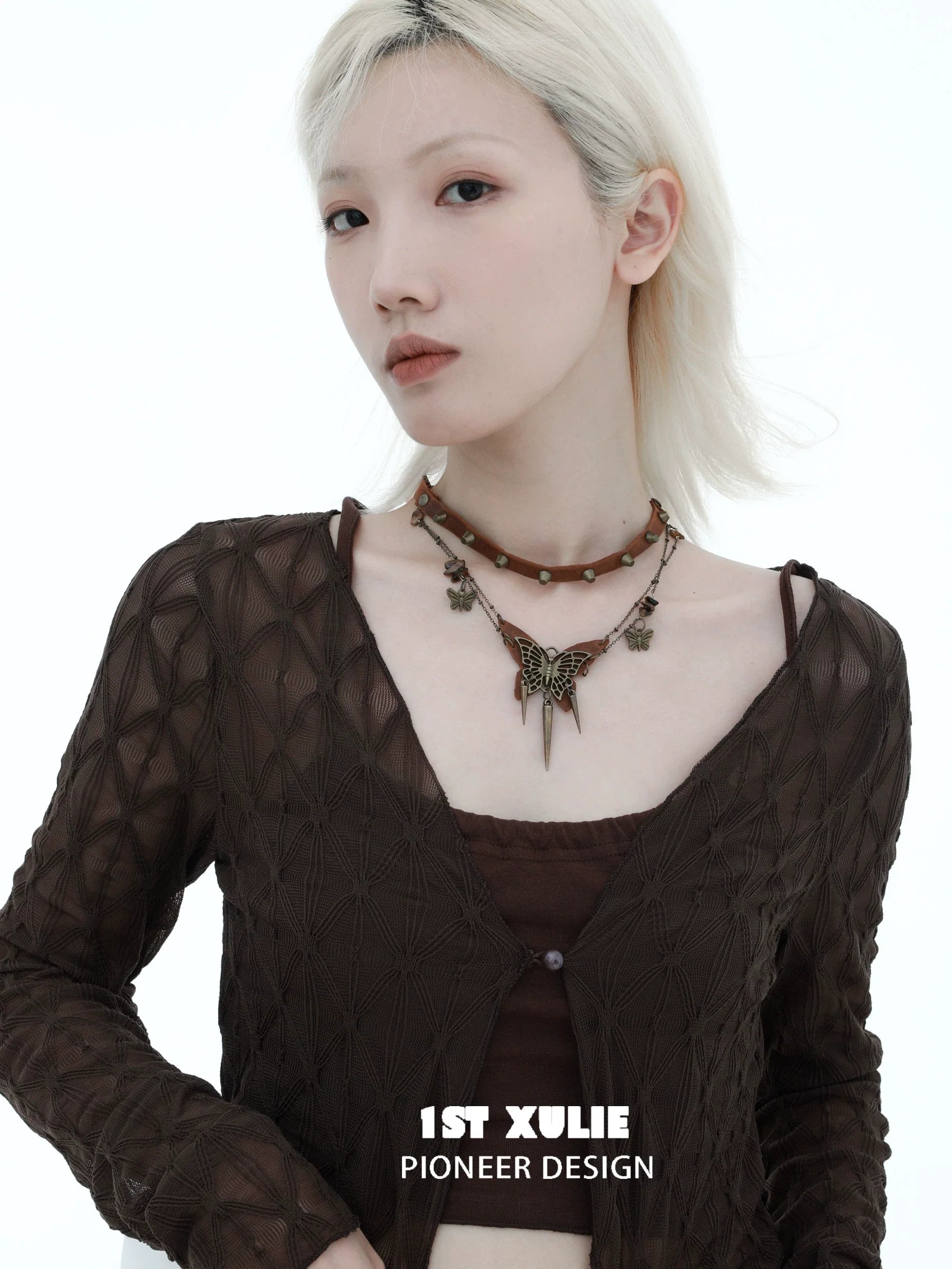 Model wearing a Y2K butterfly leather necklace with stylish layered design and unique charm accents