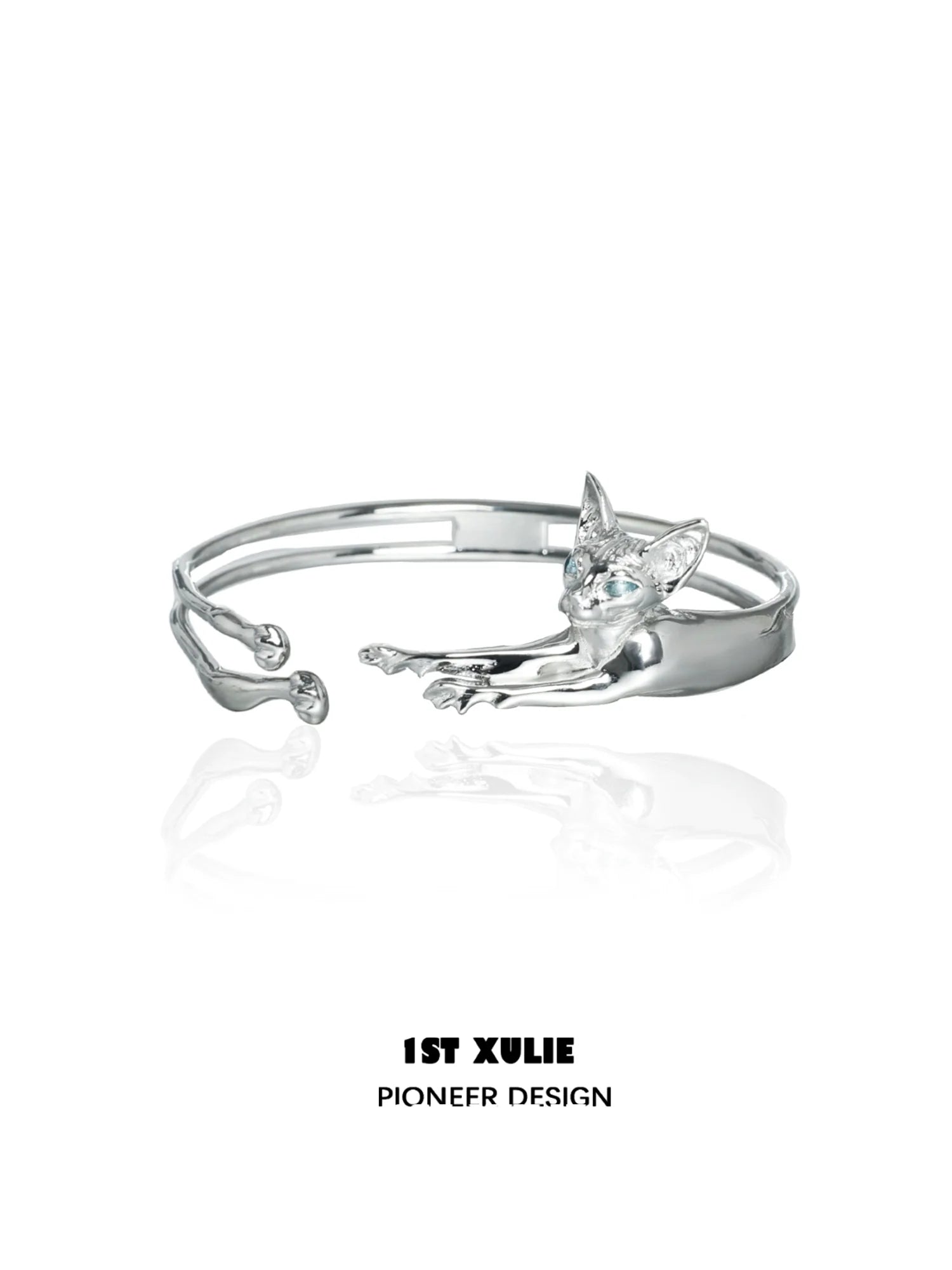 Silver Y2K cat bracelet featuring a playful cat design with blue gemstones for a trendy look