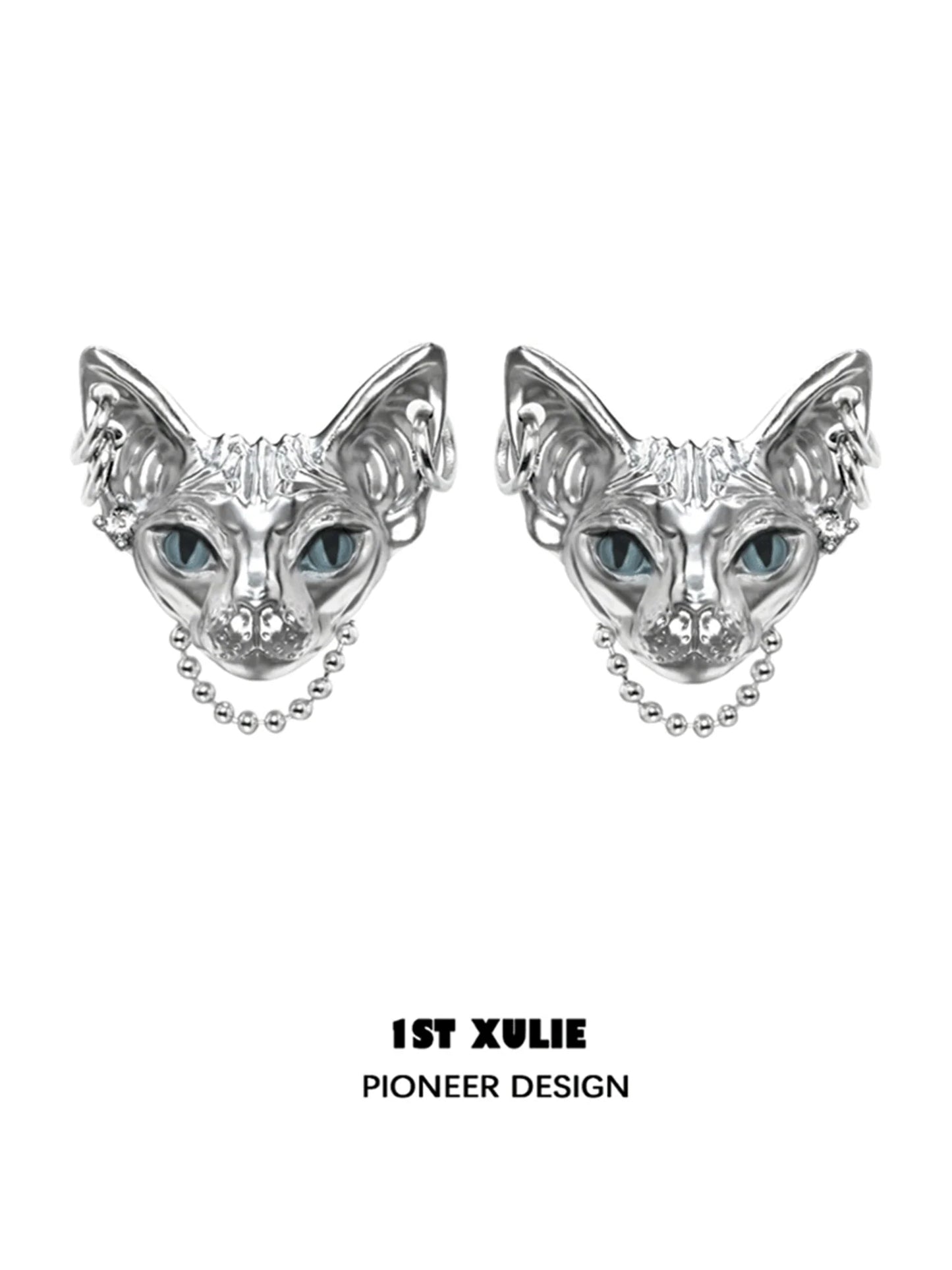 Y2K cat chain earrings in silver with intricate cat face design and blue eyes