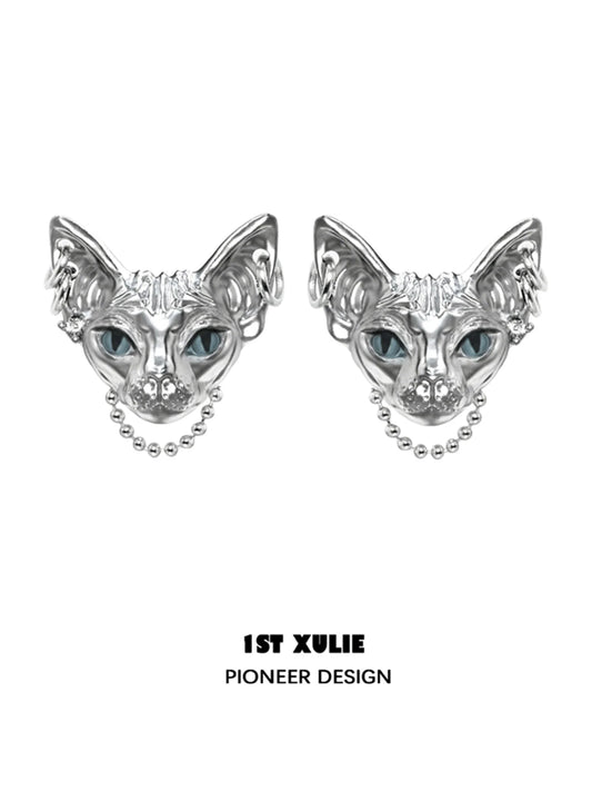 Y2K cat chain earrings in silver with intricate cat face design and blue eyes