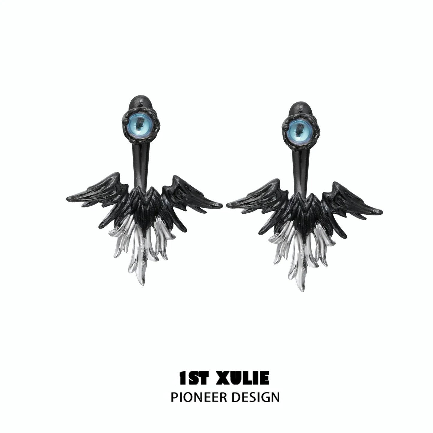 Y2K devil wing earrings featuring a striking black and white design with an eye detail