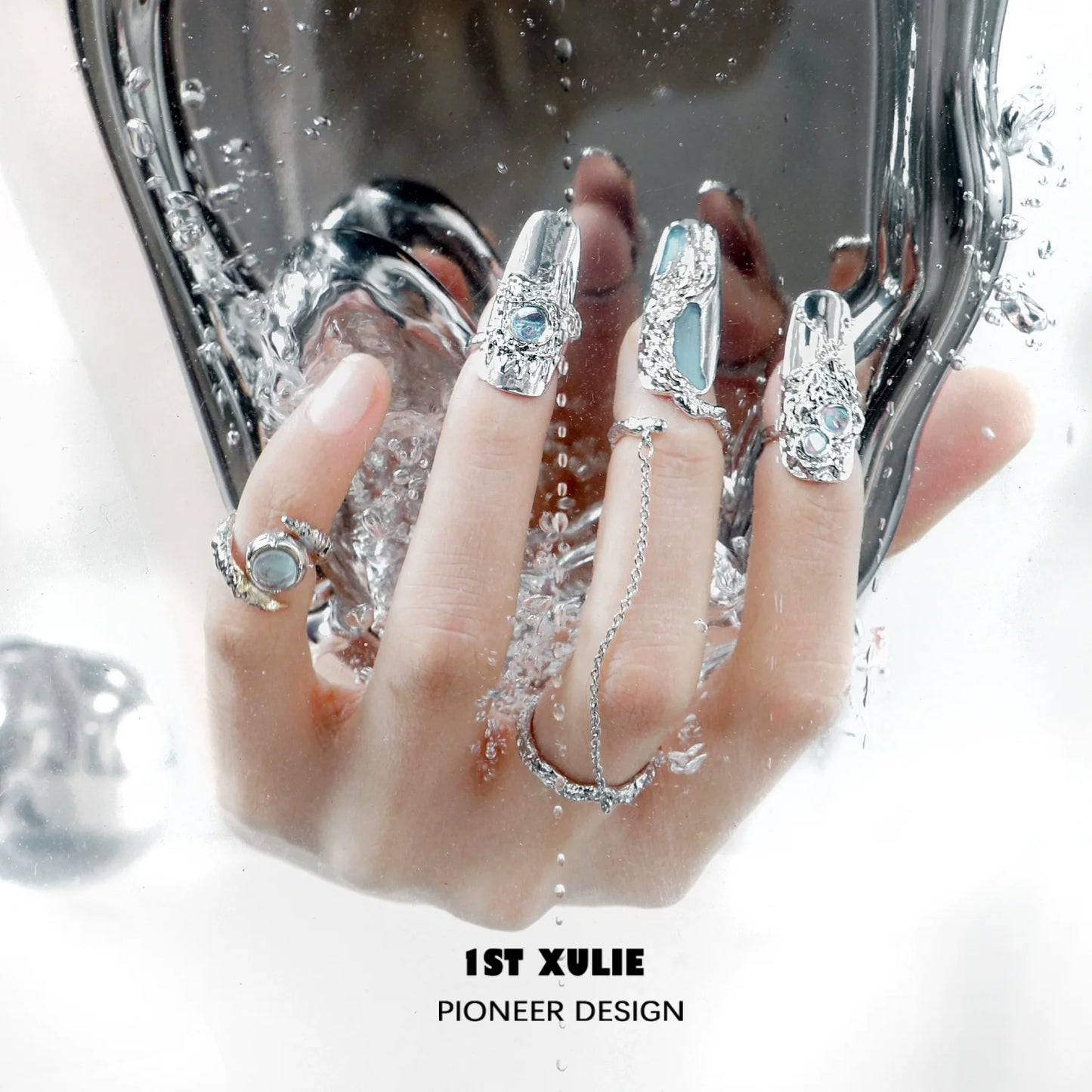 Chic Y2K fairy nail chain ring showcased on fingers with glittering details and unique design