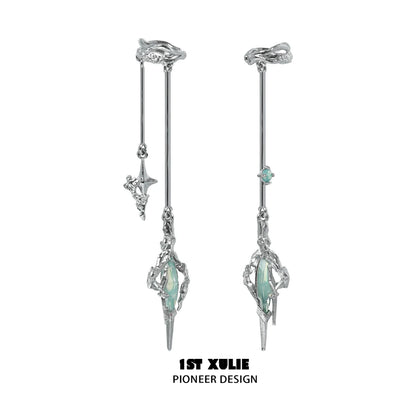 Y2K fantasy earrings with silver design and green gemstones for a stylish look