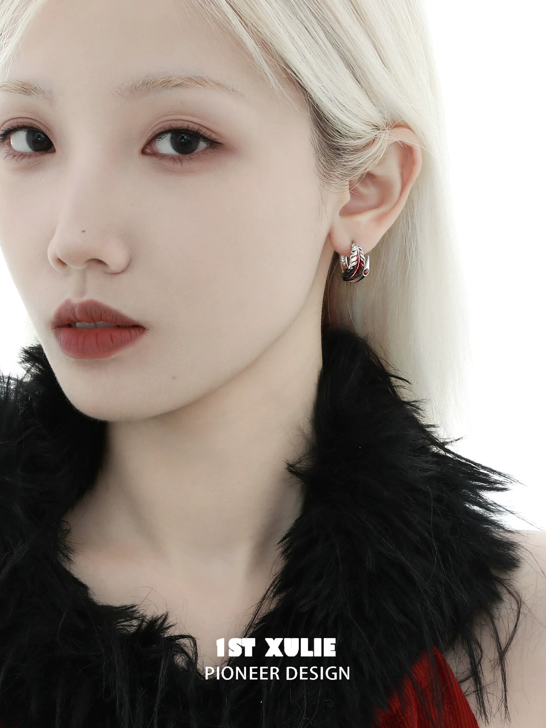 Model wearing Y2K feather earrings featuring vibrant colors and a trendy design