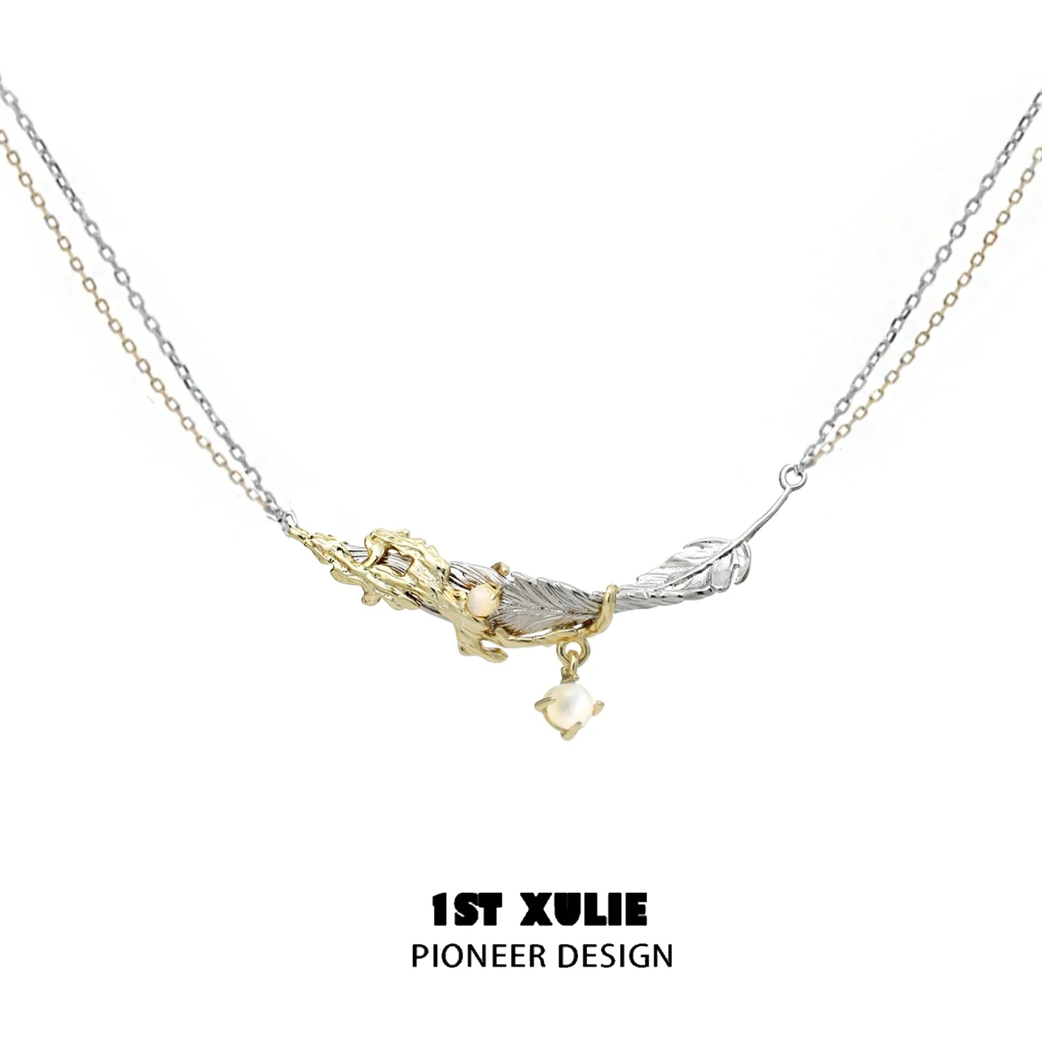 Stylish Y2K feather necklace with silver and gold chains, featuring a unique design and charm.