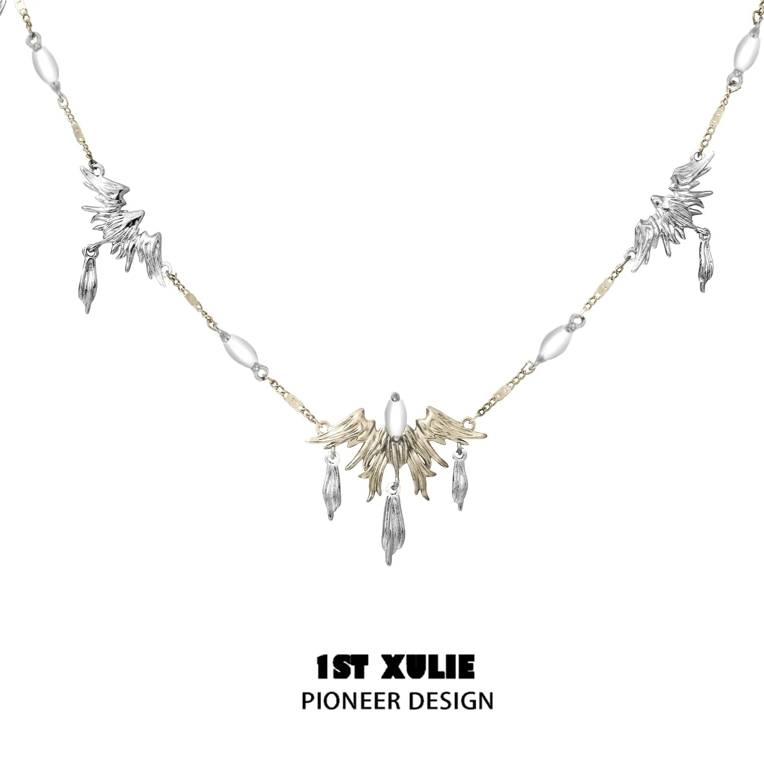 Y2K feather necklace in silver and gold with unique bird and feather pendants