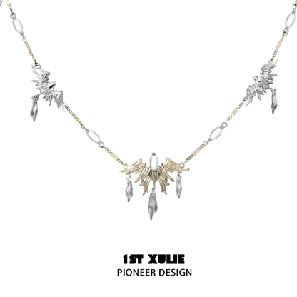 Y2K feather necklace in silver and gold with unique bird and feather pendants
